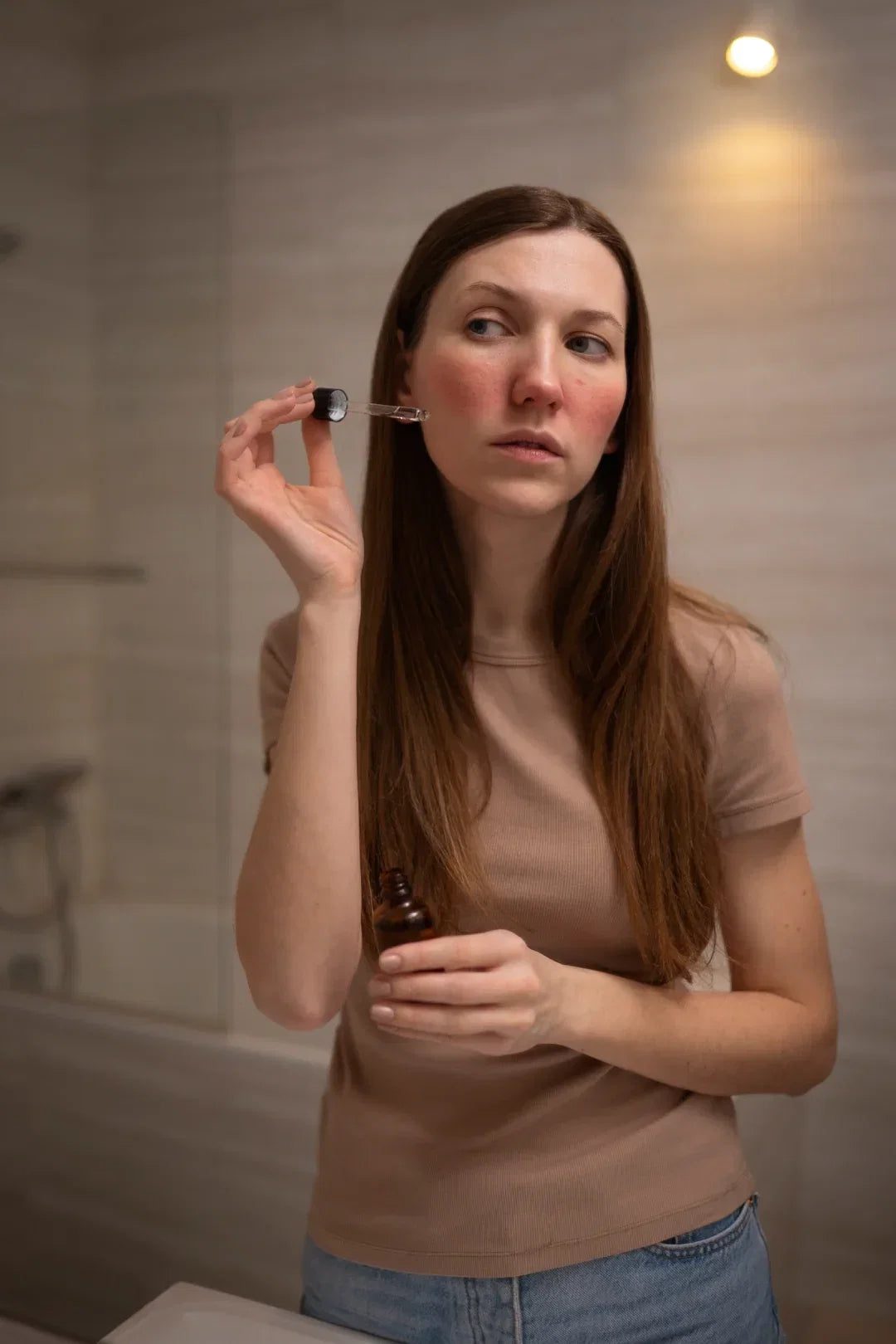 Rosacea: diffuse facial redness with visible blood vessels"  